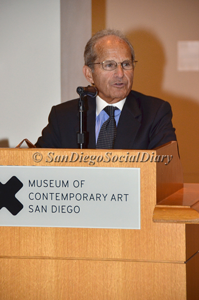 Dr. Robert Singer accepting an award with grace